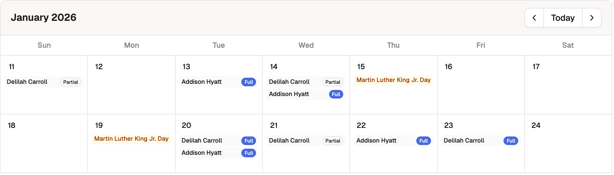 Two weeks of the calendar with team members out on several days as Full and Partial badges and an amber holiday badge.